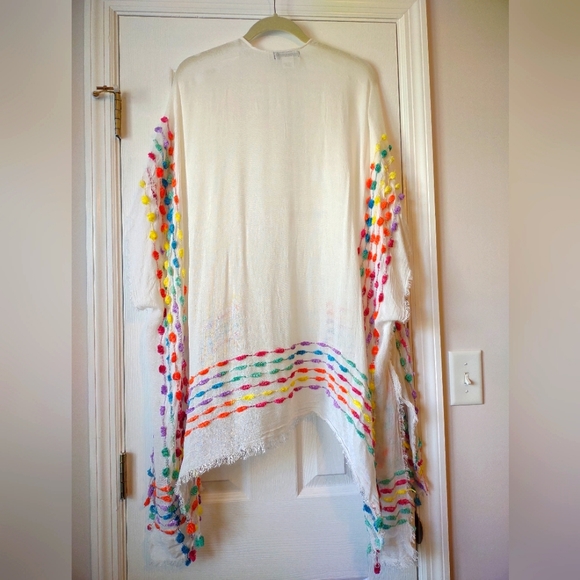 Pom Pom Rainbow Topper from Accessory Street is perfect for just a lite coverup - Picture 4 of 6